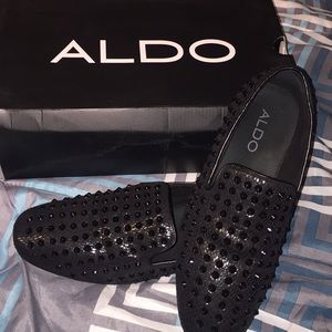 All black spiked Aldo loafers